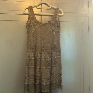 Boho A-line knee length dress with beautiful details. Size S; Magic